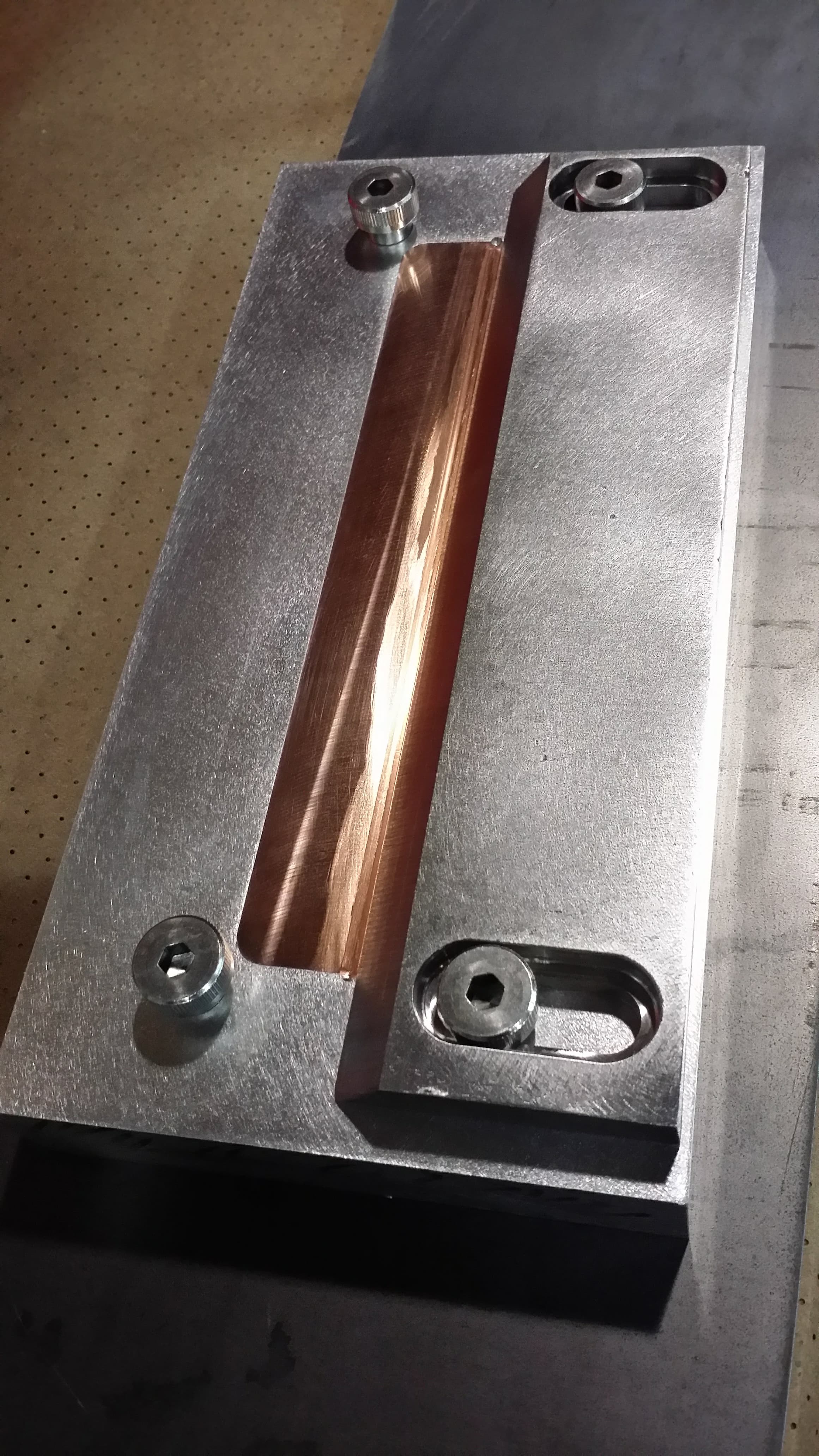 Machined fixture from the Fab Metal Shop photograph archive