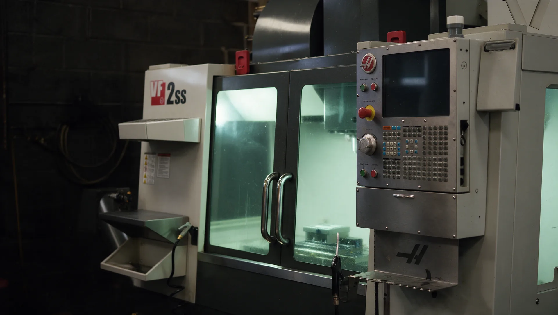Haas VF-2SS vertical machining center in an industrial workshop